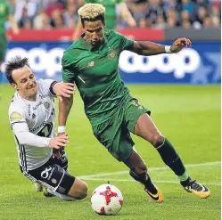  ?? Picture: AP. ?? Celtic’s Scott Sinclair slips past the challenge of Rosenborg’s Mike Jensen.