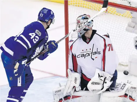  ?? NATHAN DENETTE/THE CANADIAN PRESS ?? Toronto Maple Leafs centre Nazem Kadri watches the puck go into the net on Wednesday in Toronto. Washington Capitals goaltender Braden Holtby allowed four goals in the game.