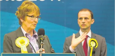  ?? Picture: Steven Brown. ?? Liberal Democrat candidate Elizabeth Riches at last week’s election count in Glenrothes where she lost to the SNP’s Stephen Gethins, right, by only two votes. However, the LibDems will not challenge the result.