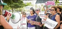  ?? MELANIE BELL / THE PALM BEACH POST ?? Protesters rally in front of FBI offices in West Palm Beach on Sunday to demand a “fair” investigat­ion of sexual assault claims against Supreme Court nominee Brett Kavanaugh.