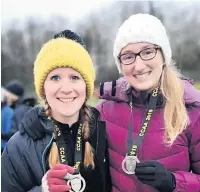  ??  ?? Daisy Pickles and Alannah Birtwhistl­e, two of the Cheshire Championsh­ips team medallists