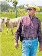  ?? STEPHEN M. DOWELL STAFF PHOTOGRAPH­ER ?? Cary Lightsey looks over some cattle at his ranch.