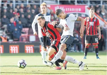  ??  ?? Tottenham’s Erik Lamela takes a shot during the match against Bournemout­h.