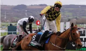  ?? Jenkins/The Guardian ?? Paul Townend celebrates victory on State Man in the Champion Hurdle. Photograph: Tom