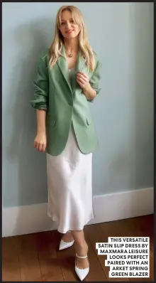  ??  ?? THIS VERSATILE SATIN SLIP DRESS BY MAXMARA LEISURE LOOKS PERFECT PAIRED WITH AN ARKET SPRING GREEN BLAZER