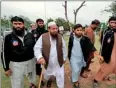  ??  ?? The United States has offered a $10 million reward for the capture of Hafiz Mohammad Saeed (C) the founder of the Pakistan-based Islamist militant group blamed for the 2008 terror attacks in Mumbai (AFP)