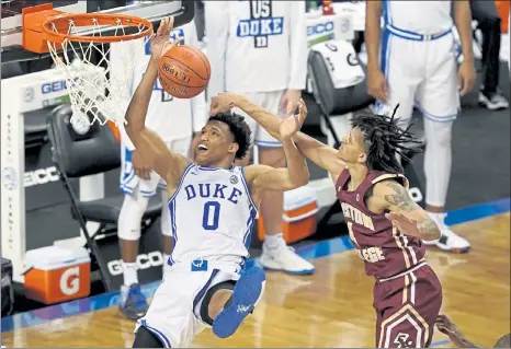  ?? AP ?? Duke forward Wendell Moore Jr. is fouled by Boston College guard Makai Ashton-Langford during Tuesday’s game.