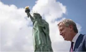  ??  ?? Mayor Bill de Blasio departs Liberty Island following a dedication ceremony for the new Statue of Liberty Museum on Thursday. Photograph: Drew Angerer/Getty Images