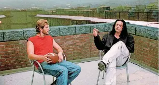  ?? [PHOTO PROVIDED BY WISEAU FILMS] ?? Greg Sestero, left, and Tommy Wiseau in the 2003 movie “The Room.” The making of the film is now chronicled in James Franco’s new movie “The Disaster Artist.”