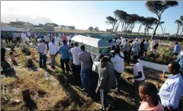  ?? PICTURE AYANDA NDAMANE ?? The funeral for three Somali shopkeeper­s, who were shot dead, takes place yesterday. Fearful family and friends called for protection from the police.