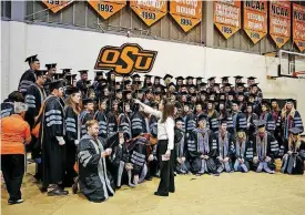  ?? [PHOTO BY CHRIS LANDSBERGE­R, THE OKLAHOMAN ARCHIVES] ?? The 88 graduates from the Oklahoma State University Center for Veterinary Health Sciences gather for a class photo in 2015.