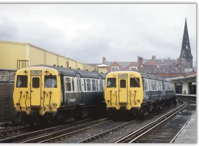  ??  ?? A couple of Class 503s Nos. M28382M and M28388M (both DMBS b. 1956) are seen in the sidings at New Brighton awaiting their ne  t duty on     th   pril         .   otice the driver walking   y the side of the conductor rail which,   ecause it is a station area, has a protective wooden   ar along the outside of the rail.