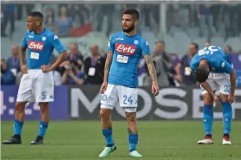  ?? AP ?? Napoli’s Lorenzo Insigne ( centre) reacts after the 0- 3 loss to Fiorentina in their Italian League match at the Artemio Franchi Stadium in Florence on Sunday. —