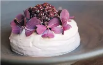  ??  ?? Mousse de foie de volaille is served with lightly fermented elderberri­es and purple clover.