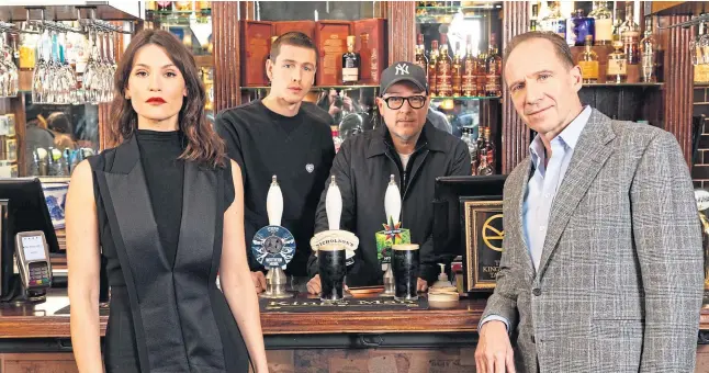  ?? ?? (Left to Right) Gemma Arterton, Harris Dickinson, Matthew Vaughn and Ralph Fiennes attend the opening of ‘The King’s Man pub’ at The Crown in Soho.