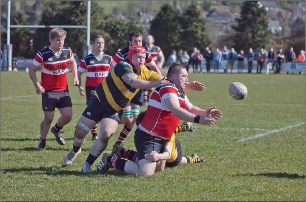  ??  ?? Wicklow’s Seamus O’Brien gathers under pressure during the Seconds Cup quarter-final against Co. Carlow RFC. Photo: Paul Messitt