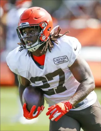  ?? Associated Press ?? Cleveland Browns running back Kareem Hunt runs the ball during practice Monday at team’s training facility in Berea, Ohio. the