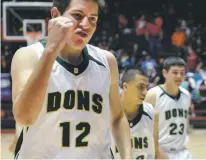  ?? CLYDE MUELLER/NEW MEXICAN FILE PHOTO ?? West Las Vegas High’s D.J. Bustos pumps his fist following the Dons’ victory against Taos in a Class AAAA state tournament semifinal game in 2015 at The Pit. Bustos will play for New Mexico Highlands University.