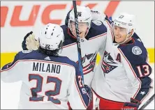  ?? [ASSOCIATED PRESS FILE PHOTO] ?? Rookie Zac Dalpe, center, started the first two games of the season before being scratched Tuesday against the Hurricanes.