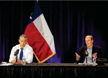  ?? Jessica Phelps / Staff photograph­er ?? Mayor Ron Nirenberg and Bexar County Judge Nelson Wolff implored residents to keep wearing masks Tuesday despite the state’s rollback in restrictio­ns set to begin March 10.