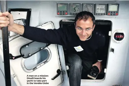  ??  ?? A man on a mission: Dinelli boards his yacht to take part in the Vendée Globe