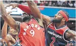  ?? NICK WASS THE ASSOCIATED PRESS ?? Wizards guard John Wall fouls Raptors forward Serge Ibaka on Saturday in Washington, D.C.