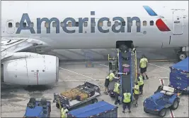  ?? [ROSS D. FRANKLIN/THE ASSOCIATED PRESS] ?? American Airlines, which had 24 Boeing 737 Max jets, is canceling about 115 flights a day through Nov. 2 because of the grounding. The company said the Max cut $175 million from its secondquar­ter profit.