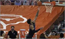  ?? MICHAEL THOMAS — THE ASSOCIATED PRESS ?? Villanova guard Justin Moore drops in a layup against Texas on Sunday. The sophomore guard was named Big 5 Player of the Week.