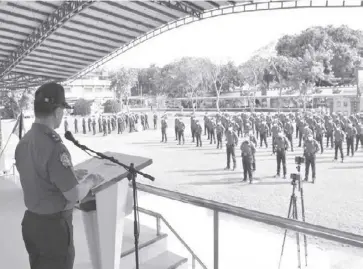  ?? ?? “You delivered beyond what is expected from you during deployment, from acting as precinct finders, navigators and even nannies to the children of would-be voters. You remained true to your duty,” Police Regional Office 6 director, Police Brigadier General Flynn Dongbo, tells policemen in Camp Delgado, Iloilo City.