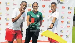  ?? Picture: VUYOKAZI NKANJENI ?? SKILLED WHISTLEBLO­WERS: Eastern Cape Premier Soccer League and Caf referee Akhona Makalima, centre, with Gcobisa Maleki, right, and Sisonke Jikazayo at the SAB and Safa SAB League match officials training camp in Pretoria