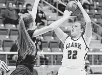  ?? ?? Clark’s Hailey Adams (22), lining up a shot against Brandeis, finished with 11 points, six assists and a pair of blocks.