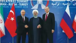  ?? (Reuters) ?? PRESIDENT PUTIN of Russia, Rouhani of Iran, Erdogan of Turkey meet in Tehran on Friday.