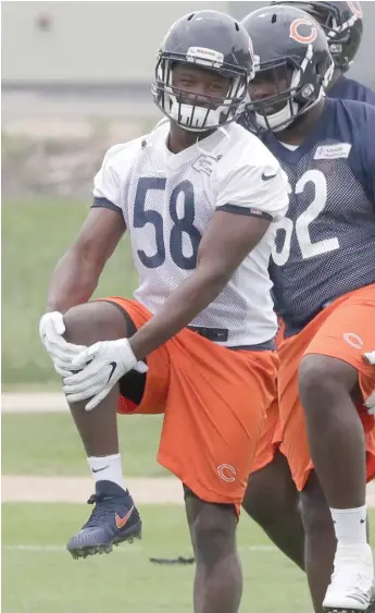  ?? CHARLES REX ARBOGAST/ AP ?? Rookie linebacker Roquan Smith stretches during the Bears’ OTAs in May.