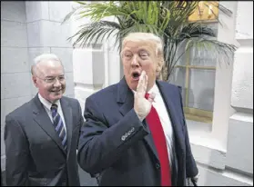  ?? J. SCOTT APPLEWHITE / ASSOCIATED PRESS ?? President Donald Trump and Health and Human Services Secretary Tom Price arrive on Capitol Hill on March 21 to rally support for the Republican health care overhaul.