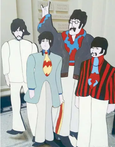  ??  ?? Life-size caricature­s of The Beatles greet visitors of the V&A Museum.