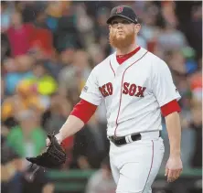  ??  ?? NOT GOOD: Reliever Craig Kimbrel walks off the mound after giving up the go-ahead run in the eighth inning of yesterday’s loss.