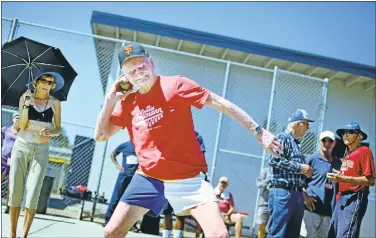  ?? PHOTOS BY SANDY HUFFAKER ?? Don Pellmann, who is 100 years old, competes in the shot put at the San Diego Senior Games at Mesa College in San Diego.