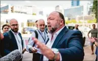  ?? Sergio Flores / for Hearst Connecticu­t Media ?? Alex Jones speaks to the media outside the 459th Civil District Court on Aug. 2, in Austin, TX.