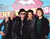  ?? DAVE J. HOGAN ?? Charlie Watts ( from left), Keith Richards, Ronnie Wood and Mick Jagger attend a 2016 preview of “The Rolling Stones: Exhibition­ism” in London.