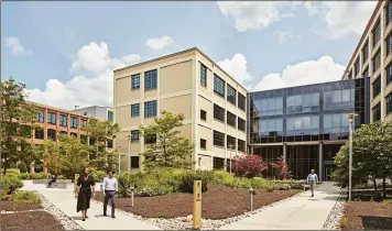  ?? Contribute­d photos ?? An exterior view of the Winchester Works biotech center in New Haven.