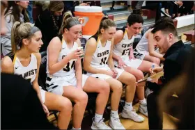  ?? JAMES BEAVER/FOR MEDIANEWS GROUP ?? Central Bucks West coach Zach Sibel gives last minute directions to the Lady Bucks in the closing minutes of the fourth quarter against Freedom Tuesday night.