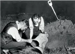  ?? ?? ■ Journalist­s from the Sydney Morning Herald recreate the discovery of Emden’s bell after it had been stolen and buried.