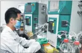  ??  ?? A Bio-Thera Solutions researcher works in a laboratory. The company is one of the beneficiar­ies of Guangzhou’s rich talent pool.