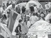  ?? Ringo Chiu For The Times ?? PROTESTERS set up tents at UCLA last week, part of a wave of antiwar activism at U.S. colleges.