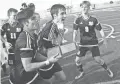  ?? PATRICK BREEN/THE REPUBLIC ?? Desert Vista players celebrate their state title victory over Brophy on Saturday.