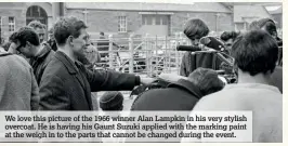  ??  ?? We love this picture of the 1966 winner Alan Lampkin in his very stylish overcoat. He is having his Gaunt Suzuki applied with the marking paint at the weigh in to the parts that cannot be changed during the event.