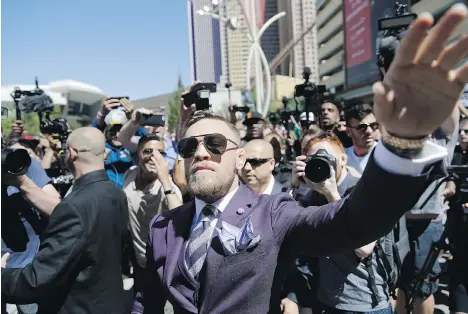  ?? JOHN LOCHER/THE ASSOCIATED PRESS ?? Conor McGregor will fight Floyd Mayweather Jr. in a super-welterweig­ht boxing match at T-Mobile Arena on Saturday to cap a weeklong, circus-like charade that only Las Vegas can provide.