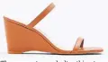  ??  ?? The square toe and ultra-thin straps elevate this Aldo option.
Aldo, $95, aldoshoes.com