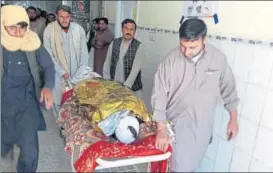  ?? AFP ?? Relatives of a victim of the cross border firing in the border town of Chaman.