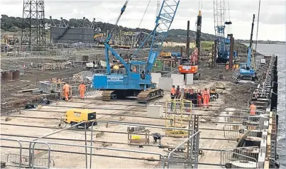  ??  ?? A £10m redevelopm­ent of part of Dundee Port is progressin­g. The upgrade will give the port greater heavy lifting capabiliti­es and improve its capacity for renewables and decommissi­oning work.